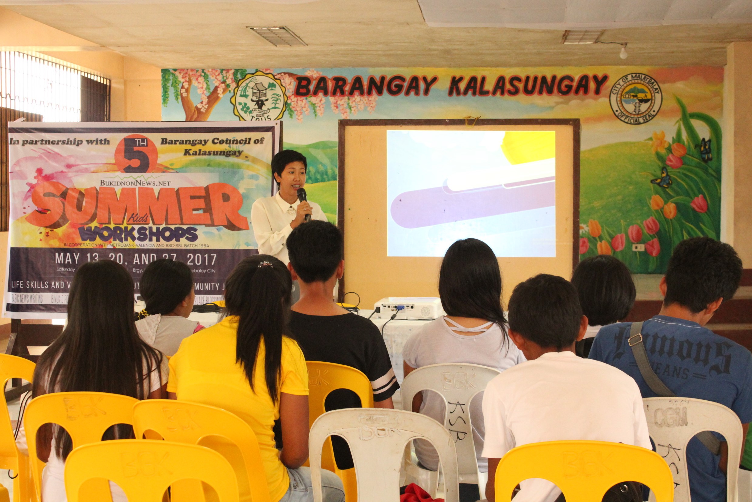 Ms. Iyren Dalipe, one of the resource persons, speaks during the 5th Summer Youth Journalism Workshop in partnership with Brgy. Kalasungay in May 2017/BukidnonNews.Net photo